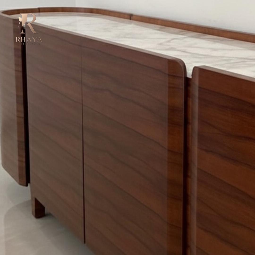 Sideboard cabinet in polished walnut wood with a smooth white marble top featuring gray veining for modern dining rooms.
